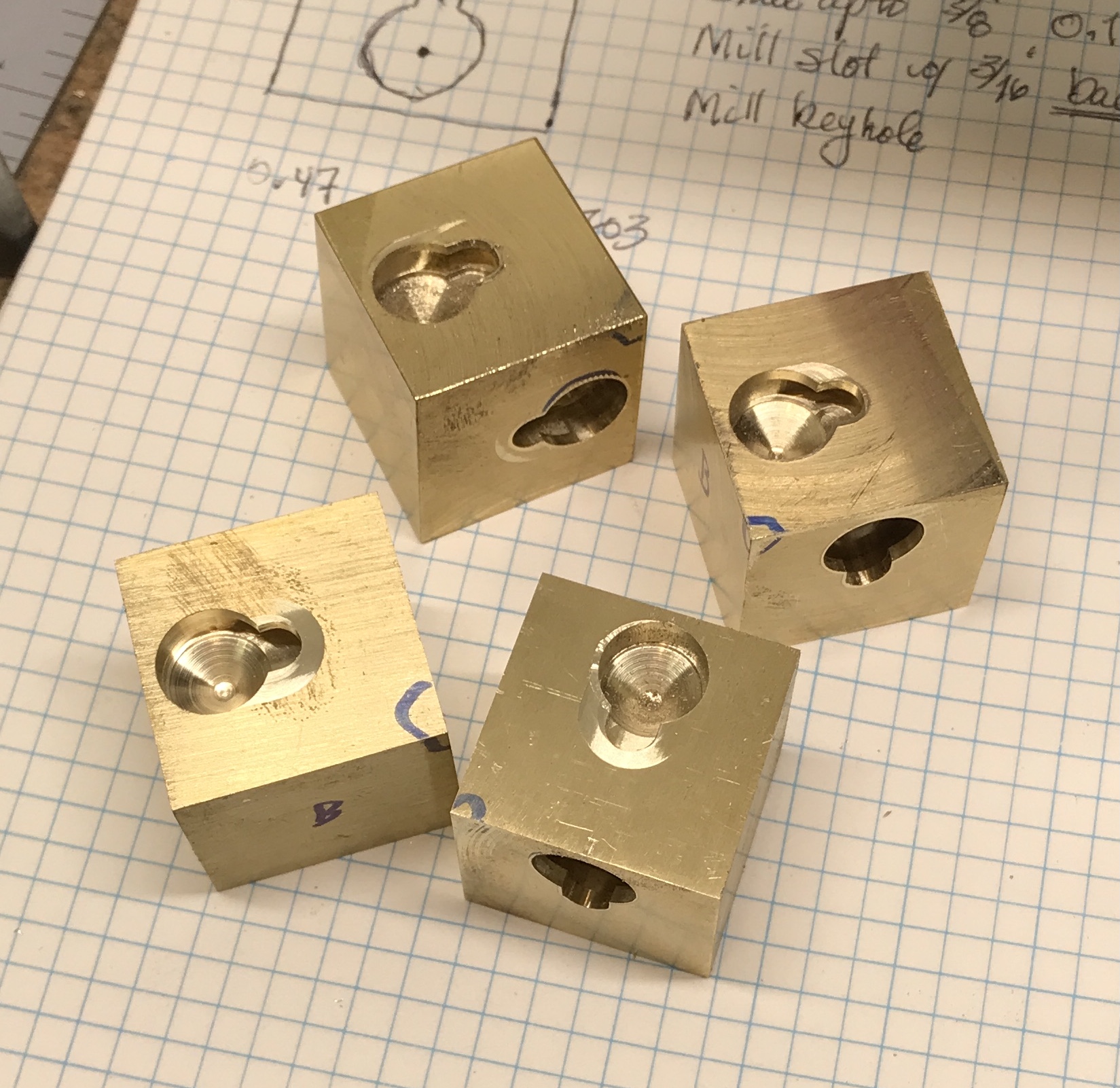 Seven slots completed in the brass cubes